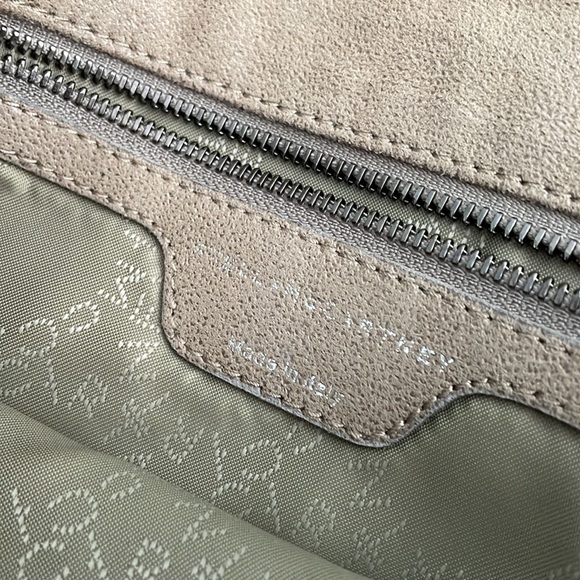 Authentic Stella McCartney tan sueded bag with chain trim and strap